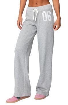 Sporty numbering at the thigh lends ultracool athletic style to these cozy cotton-blend sweatpants made with trendy wide legs. Elastic/drawstring waist 50% cotton, 50% polyester Machine wash, dry flat Imported Plaid Wide Leg Pants, Sweatpants Style, Drawstring Sweatpants, Wide Leg Sweatpants, Athletic Style, Swaggy Outfits, Plaid Pants, Wide Legs, Athletic Fashion