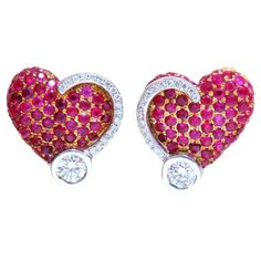 Ruby and Diamond Heart Form Dangle earrings. .44ct. round rubies, full brilliant cut clean clarity and transparent 1.00ct. natural round diamonds G color vs2 clarity. 14 karat yellow gold 5.6 grams 13.7 x 14.2mm long $5,000 appraisal certificate will accompany Luxury Yellow Gold Earrings For Valentine's Day, Luxury Yellow Gold Heart Diamond Earrings, Alexis Bittar Jewelry, Ruby Jewelry, Ruby Diamond, All That Glitters, Natural Ruby, Diamond Heart, Heart Earrings