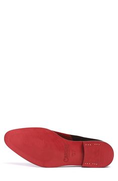 A dapper loafer crafted from luxe velvet is set on a bold sole for statement style. Cushioned footbed Velvet upper/leather lining/rubber sole
 Imported Red Slip-on Loafers With Plain Toe, Red Flat Slip-ons With Leather Sole, Slip-on Dress Shoes With Red Sole And Round Toe, Red Leather-sole Moccasins With Moc Toe, Red Oxfords With Rubber Sole For Work, Red Leather Moc Toe Loafers, Leather Loafers With Red Sole And Moc Toe, Red Leather Shoes With Textured Sole For Formal Occasions, Slip-on Leather Shoes With Red Sole And Almond Toe