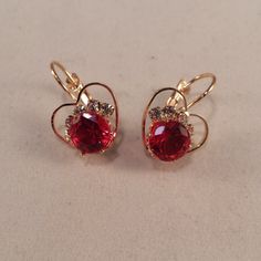 These Beautiful Ruby Red Heart Cut Shape Czech Crystal Earrings Are Gold Plated. Brand New And Never Been Worn. Lead And Nickel Free. These Fine Quality Earrings Are Perfect For Everyday Wear, Special Occasions, Or A Special Gift. Get An $18 Gift Of Your Choice In My Listings With Purchase Of Two Or More Items. Please Send Offers And Questions. Large Round Czech Crystal: 8mm Fastening: Clip Back Dangle (Pierced) Elegant Red Earrings With Heart Charm, Elegant Red Heart Charm Earrings, Elegant Red Double Heart Earrings, Red Double Heart Earrings For Party, Red Heart Earrings For Wedding, Red Heart Charm Earrings For Party, Czech Crystal, Christmas 2024, Ruby Red