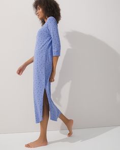 Why you’ll love it: The long pajama sleepshirt with piped details will perfect your winter warm-up routine with cozy jersey fabric in a foil print with sparkle. Details Scooped neckline. 3/4 sleeve with banded cuff and piped details. Back of neckline reinforced with satin charmeuse binding. Side slits at hem. Approximately 51.5" from shoulder on body. 57% cotton, 38% modal, 5% spandex. Machine wash, cold. Imported. Casual Spring Sleepwear With 3/4 Sleeve, Casual 3/4 Sleeve Spring Sleepwear, Stretch Long Sleeve Sleepwear For Winter, Winter Stretch Sleepwear With Long Sleeves, Blue Stretch Long Sleeve Sleepwear, Blue Long Sleeve Stretch Sleepwear, Stretch Cotton Winter Sleepwear, Fitted Long Sleeve Winter Sleepwear, Fitted Cotton Sleepwear For Overnight