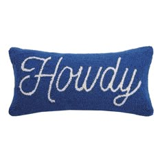 a blue pillow with the word'hody'written in cursive font