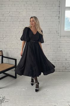 black puff sleeve midi dress with a belt and v-neckline Chic V-neck Dress With Belt, Chic V-neck Dress With Belt Detail, Black Fitted V-neck Belted Dress, Formal Belted V-neck Dress, Formal V-neck Belted Dress, Formal V-neck Dress With Belt, Chic V-neck Midi Dress With Belt, V-neck Party Dress With Belt, Elegant V-neck Dress With Belt Detail