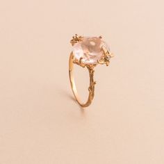 Say hello to our fan favorite! The delicate floral details on this ring surrounds the stunning oval cut rose quartz to set a statement you didn't know you needed. Approximate stone measurement: 3/8” x 1/2” Finish: 18k rose gold plated Material: sterling silver, genuine rose quartz gemstone Item #: 13056 FAIRPRICING $130 TOORIGINAL | $170 ESTIMATED RETAIL All of our items are priced specially while keeping the same high standard quality. Rose Quartz Flower Ring, Cheap Rose Gold Round Crystal Ring, Rose Gold Ring With Rose Quartz, Luxury Rose Gold Rose Quartz Jewelry, Gold In Quartz Ring, Rose Quartz Jewelry Rings, Rose Quartz Princess Cut Ring, Rose Quartz Wedding Ring Raw, Luxury Gold Rose Quartz Jewelry