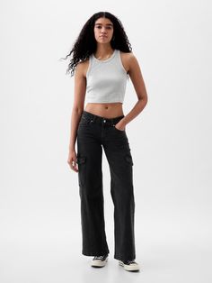 Fit: Low slung & loose in the hip & thigh.  With a relaxed wide leg, easy fit & full-length cut. ​ Size down for a slimmer fit.  Fabric: 99% Regenerative Cotton, 1% Stretch.  ​ Stretch: No Stretch Jeans.  Authentic denim that gets better with every wear.  Made to wear all day & break in over time.  Rise: Low Rise Jeans.  Look: A five-pocket cargo jean in a black wash.  Details: Zip fly, five-pocket styling, & cargo side pockets.  Responsibly Made:This pair of jeans is part of our water-saving Wa Low Rise Wide Leg Cargo Pants, Combat Jeans Women, High Waisted Black Cargo Jeans, Minju New Jeans, Hyejin New Jeans, Lee Hyein New Jeans, Cargo Jeans Black, Wide Leg Black Jeans, Low Rise Jean