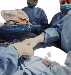 two doctors are performing surgery on an injured person's arm and leg in blue gowns