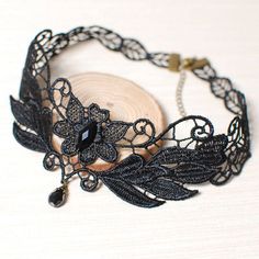 A beautiful Black Lace Choker Necklace Gothic style hand made with unique elaborate floral Victorian design. A wonderful piece to match your dress for work or evening gowns for special occassion. Black Flower-shaped Jewelry For Wedding, Black Flower-shaped Wedding Jewelry, Black Flower Shaped Wedding Jewelry, Vintage Black Choker For Gifts, Elegant Adjustable Jewelry For Masquerade, Black Flower Choker As A Gift, Adjustable Black Flower Jewelry, Black Flower Choker For Gifts, Handmade Black Necklaces For Wedding