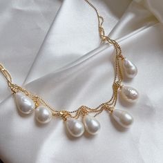 Item Information: -ready to ship -material: 10-11mn teardrop Edison high luster and high quality freshwater pearls, 14k gold plated, brass -length: 40cm + extension 5cm -adjustable length  -due to the nature of freshwater pearls, it has some flaws -come with a gift box Shipping policy: Domestic orders will be shipped via Canada Post with tracking number, should arrive in 3-5 business days, but some delays may occur, please be patient with your order. US orders will be shipped via Canada Post tra Baroque Pearl Teardrop Jewelry With Pearl Chain, Teardrop Baroque Pearl Chain Jewelry, Pear-shaped Pearl Chain Jewelry, Gold Teardrop Pearl Drop Necklace, Pearl White Teardrop Pearl Necklace As A Gift, Pearl Teardrop Drop Necklace With Pearl Charm, Teardrop Pearl White Pearl Necklace For Gift, Teardrop Pearl White Necklace As A Gift, Pearl White Teardrop Pearl Necklace For Gifts