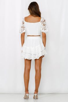 Length from waist to hem of size S: 39cm. White mini skirt. Lined. Cold hand wash only.  Model is a standard XS and is wearing size XS.  True to size.  Lightweight, crochet lace shell; sheer chiffon contrast. Shirred, elasticised waist.  No zipper. Slip-on style.  Floral placement may vary. Polyester.   It has ruffles, it has floral-themed lace, what could be better than the Cottagecore Skirt Made to cater to the farmgirl aesthetic you鈥檝e been loving on Instagram, the Cottagecore Crop + Skirt will definitely be your next Springtime edit! We admit wee low key obsessed with the floaty ruffle style and the contrasting chiffon overlay over the top! Wee teaming ours with woven jute mules, a matching straw sun hat and fine gold jewellery, ready to pick the flowers and frolic in the fields! Cottagecore Skirt, Crop Skirt, White Mini Skirt, Chiffon Overlay, Ruffles Fashion, Farm Girl, Sheer Chiffon, White Crop Top, Embroidered Lace