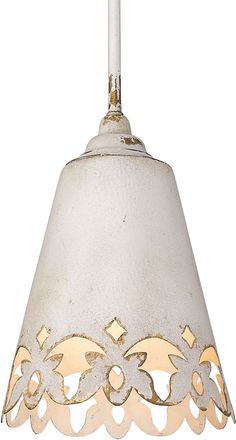 a white light hanging from a ceiling with an intricate design on the top and bottom