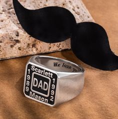 Handmade Signet Rings for Men - This ring makes a wonderful gift for any occasion for the men, fathers, brothers, boyfriends, and husbands in your life. Customizable Ring - You can fill in up to 4 names or dates, and both sides of the ring can be customized. Highest Quality Material - All rings will not fade, tarnish or stain your skin. Durable metal that can stand up to wear and tear. Item specifics: Style Men's Ring Measurements Ring Surface Height: 1.5CM (0.6INCH) Material Copper/ Silver 925 Personalized Black Jewelry For Father's Day, Black Jewelry For Father's Day Personalized Gift, Black Jewelry With Engraving Option For Father's Day, Black Stainless Steel Jewelry For Anniversary, Customizable Rectangular Stainless Steel Jewelry, Personalized Adjustable Signet Ring For Promise, Father's Day Black Engraved Jewelry, Adjustable Nickel-free Signet Ring For Anniversary, Black Sterling Silver Jewelry For Father's Day