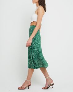 Price Comparison Few Moda $49 Alice + Olivia $440 Max Mara $125 Product Details Fun and fresh, this midi skirt is done in a sweet green print with a simple silhouette.- Back zipper- Lined- Content: 100% Polyester Style# K22WSK60008 Fit Notes - Model wearing a size S- Model measurements: Height: 5'10" Bust: 34" Waist: 24" Hips: 35" Bra Size Charts, Simple Silhouette, Green Print, Price Comparison, Green Skirt, Max Mara, Active Wear Tops, Alice Olivia, Bra Sizes