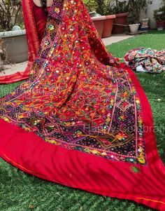 Product Item: Full Embroidery Work Dupatta  Size- Length> 86 Inch (2.25' Meter) Width >38 Inch Approx. Please share color choice after buying Fabric> Cotton Uses: (1)Traditional Wear: These dupattas can be paired with traditional Indian outfits like salwar kameez, anarkali suits, lehengas, and sarees. They add a touch of elegance and ethnicity to your attire. (2)Casual Wear: You can also wear these Phulkari dupattas with your everyday casual outfits like jeans and kurtis to give them a pop of color and style. (3)Festivals: These dupattas are perfect for festive occasions like Diwali, Holi, Eid, or other cultural celebrations. The intricate embroidery and mirror work can make you stand out during festivities. (4)Weddings and Special Occasions: They are great choices for attending weddings, Red Bohemian Dupatta For Navratri, Red Bohemian Blouse For Navratri, Red Bohemian Blouse Piece For Navratri, Red Bohemian Blouse Piece For Diwali, Bohemian Red Blouse Piece For Diwali, Bohemian Red Saree For Navratri, Bohemian Red Chanderi Choli, Red Bohemian Chanderi Choli, Red Traditional Wear With Pallu For Festival