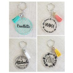 four key chains with different designs and words