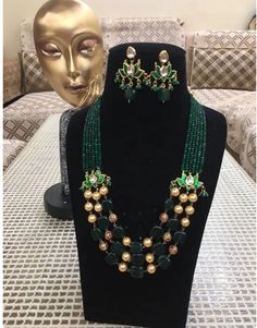 Royal Sabyasachi Neckless/Sabyasachi jewelry/Sabyasachi choker/Navratana Neckless set/bollywood jewelry/Indian choker/Indian wedding set Is Inspired By Sabyasachi Wedding Kundan jewelry Such intricate detailing in this Inspired Heritage Royal Set with Green Emerald setting stones and Flawless Polki and Diamond work. This set will surely make heads turn .. Finest Kundan work . *Necklace length can be adjusted thorough Dori/cord on the back. Highest quality and best craftsmanship Earrings have Pus Pearl Necklace Indian, Long Necklace Indian, Green Necklace Set, Sabyasachi Wedding, Kundan Long Necklace, Indian Choker, Sabyasachi Jewellery, Kundan Work, Jewelry Ruby