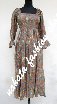 ITEM DESCRIPTION boho and hippie style maxi dress - square neckline with smocked maxi dress - long sleeve summer maxi dress Features: Long sleeve, square neck, Long dress Material: Cotton cambric Fabric: 100% cotton soft light weight ethnic print fabrics  Sleeve Length = 22 inch For more sizes & their measurement, please refer our below chart to understand the sizes variations available with us For your size requirement, please mention your size in seller note at the time of buying. SIZE MEASUREMENT  BUSTLENGTHSHOULDER XXS34 inch51 inch13.5 inch XS36 inch51 inch14 inch S38 inch51 inch14.5 inch M40 inch51 inch15 inch L42 inch51 inch16 inch XL44 inch51 inch16.5 inch 2XL46 inch51 inch17 inch 3XL48 inch51 inch18 inch   Company Return Policy:  Please write for more information to my email direc Spring Bohemian Maxi Dress With Elastic Neckline, Bohemian Boho Dress With Smocked Bodice For Summer, Multicolor Smock Maxi Dress For Spring, Bohemian Flowy Dress With Smocked Bodice, Flowy Bohemian Dresses With Smocked Bodice, Bohemian Multicolor Smocked Dress For Vacation, Bohemian Smocked Maxi Dress With Elastic Neckline, Bohemian Summer Smocked Dress, Bohemian Maxi Dress With Smocked Bodice For Vacation