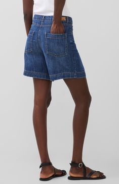 With a relaxed fit and sturdy nonstretch-denim design, these chic Bermuda shorts are destined to become a warm-weather staple. 5 1/2" inseam; 30" leg opening; 12" front rise; 13" back rise Zip fly with button closure Five-pocket style 100% cotton Machine wash, line dry Imported Relaxed Fit Recycled Denim Summer Bottoms, Summer Relaxed Fit Recycled Denim Bottoms, Relaxed Fit Shorts With Five Pockets, Relaxed Fit Recycled Denim Cutoff Bottoms, Casual Medium Wash Jean Shorts With Patch Pockets, Straight Leg Recycled Denim Summer Shorts, Relaxed Fit Short Bottoms With Five Pockets, Relaxed Fit Jean Shorts With Hip Pockets For Spring, Spring Short Length Recycled Denim Bottoms