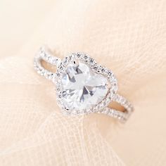 With a gorgeous & romantic style  this Beautiful Heart CZ Promise Ring is set to dazzle your loved one. Features a large 7mm x 7mm heart-shaped CZ stone. Expensive Diamond Rings, The Romantics, Coordinates Jewelry, Family Tree Necklace, Silver Heart Ring, Cz Rings Engagement, Monogram Jewelry, Sterling Silver Engagement Rings, Cz Stud Earrings