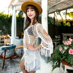 Embrace beachside elegance with our Anna-Kaci Women's White Crochet Cover Up Bathing Suit. Crafted from a blend of 65% Cotton and 35% Polyester, this cover-up features intricate crochet patterns and fringe trim for a stylish beachwear look. Summer Crochet Dress For Brunch During Beach Season, Bohemian Long Sleeve Fringe Cover-up, Bohemian White Crochet Dress For Beach Season, Crochet Fringe Dress For Beach Cover-up, Spring Crochet Fringe Dress For Beach Cover-up, Spring Vacation Crochet Dress With Fringe, Summer Beachwear Crochet Dress For Brunch, White Crochet Top For Beach Party In Spring, Summer Crochet Dress With Tassels For Beach