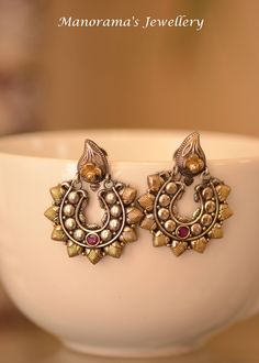 Beautiful two tone chaand baali earrings!! Totally cool, royal and chic! Statement Jewelry. Antique finish earrings. Brass Finish Earrings. Pink Glass Stone. Light Weight Earrings. Earring measure 1 3/4 inches (4 cm) in length. These earrings are made of copper brass alloy and have an antique oxidized finish to them! JEWELERY CARE INSTRUCTIONS Please make sure that these items must be treated with care and stored properly. They can easily be broken if dropped or mishandled. Jewelry should not be Ornate Dual-tone Earrings For Gift, Ornate Dual-tone Earrings As Gift, Ornate Dual-tone Earrings Gift, Dual-tone Metal Earrings In Temple Jewelry Style, Dual-tone Round Earrings For Celebration, Festive Dual-tone Dangle Earrings, Dual-tone Earrings For Celebrations And Festivals, Dual-tone Round Earrings For Gift, Multicolor Dual-tone Earrings For Celebration