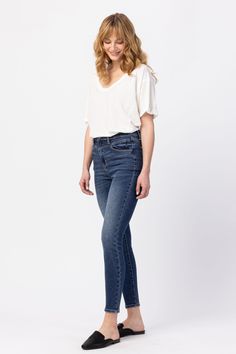 Judy Blue High Rise Front Yoke Skinny Denim 88364 Skinny fit: cut to be tight-fitting throughout the leg, from the thigh down to the ankle. Material: 94% Cotton, 5% Polyester, 1% SpandexFront Rise: 11"Inseam: 28.5"Model Info:Size: 1Height: 5'10Waist: 25"Hip: 36" Measured on the smallest size and may vary by size. Sizing Recommendation: Judy Blue jeans are very stretchy and run generous compared to other brands. We recommend sizing down one from your normal non-Judy Blue jean size. Contact us for Judy Blue Jeans, Washed Jeans, Blue Jean, Jeans Style, Blue Jeans, Levi Jeans, Denim Jeans, Jeans Size, High Rise