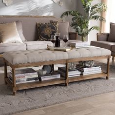 a living room filled with furniture and a coffee table