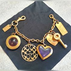 Very Rare And Hard To Find In This Condition! Vintage Coach Large Chunky Charm Bracelet Or Bag Charm. Can Be Used As Either. Gold Tone With Purple. Coach Bracelets, Bracelets With Charms, Chunky Charm Bracelet, Bracelet Bag, Coach Jewelry, Bag Charms, Jewelry Lookbook, Vintage Coach, Purple Gold