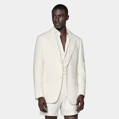 This two-button off-white blazer is cut to our tailored fit with a slightly widened notch lapel, sleek jetted pockets, and a structured shoulder. Luxury White Business Casual Outerwear, Luxury White Outerwear For Business Casual, White Luxury Sport Coat With Hidden Button Closure, Luxury White Sport Coat With Hidden Button Closure, Cream Single Breasted Blazer With Notch Lapel, White Classic Blazer With Concealed Placket, Classic White Outerwear With Concealed Placket, White Tuxedo With Single Button And Lapel Collar, White Single Button Tuxedo With Lapel Collar