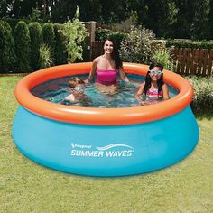 an inflatable swimming pool with two children