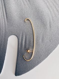 A minimalist design with simple lines and geometric shape fits . It's light and comfortable to wear . -Total length 10cm / 3.93 inches -From stud to bottom 1,5cm / 0.59 inches I use 925 Sterling Silver and then double gold plated with 22k gold. I do not use molds, every piece of jewelry is made from sterling silver sheet and wire. All of my jewelry is handmade please allow for small variances from piece to piece ,as this is a feature of owning one of the kind original handmade jewelry. Please be Minimalist 14k Gold Single Ear Climber, Minimalist Pierced Hoop Ear Climbers, Minimalist Gold Plated Wrap Earrings, Minimalist Pierced Yellow Gold Ear Cuff, Minimalist Single Ear Cuff As Gift, Minimalist 14k Gold Ear Cuff, Minimalist Gold Plated Earrings, Everyday Minimalist Yellow Gold Ear Climbers, Minimalist Ear Cuff With Matching Earrings