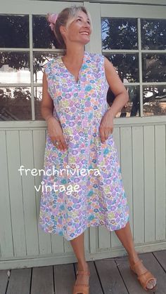 vintage midi dress Small flower patterns Very nice quality 100% cotton Made in France Tag: Gevana Sleeveless dress Colors: blue, mauve, yellow, purple, pink, green, white Front zipper 2 patch pockets on the sides V neckline Marked size 46 but fits a size L these days Measurements: armpit to armpit: 52 cm / 20.2 inches Length: 108 cm/ 42.2 inch Measurements taken flat Old dress in perfect vintage condition, no major flaws Blue Floral Print Sleeveless Dress For Daywear, Blue Floral Sleeveless Dress For Daywear, Vintage Sleeveless Beach Sundress, Floral Print Knee-length Sleeveless Day Dress, Floral Print Knee-length Sleeveless Dress For Daywear, Knee-length Floral Sleeveless Dress For Daywear, Spring Sleeveless Vintage Sundress, Vintage Cotton Sleeveless Dress, Floral Print Midi Sleeveless Dress For Daywear