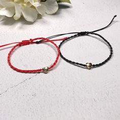 "==This listing is for a set of 2 bracelets == - Handmade item - Made to order - Materials: 14K gold filled heart (6mmx6mm), Waxed Macrame cord / polyester - Adjustable: Yes Please refer to the \"last image\" - color chart and write down the colors for Size 1 and Size 2 in the text box below: 1 color for each bracelet." Gold Heart-shaped Friendship Bracelets For Valentine's Day, Gold Heart-shaped Braided Bracelets For Valentine's Day, Gold Heart-shaped Braided Bracelet For Valentine's Day, Adjustable Double Heart Bracelets For Everyday, Handmade 14k Gold Filled Bracelet For Gift, Gold Promise Bracelet For Valentine's Day, Adjustable Double Heart Yellow Gold Bracelets, Everyday Gold Friendship Bracelets With Heart Charm, Handmade Gold Bracelets For Promise