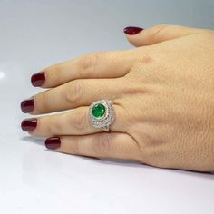 For Sale on 1stDibs - For sale is an Estate Platinum and 18K Yellow Gold Victorian Diamond & Emerald Flower Ring! Showcasing one round brilliant cut fine quality Emerald weighing Luxury Emerald Ring With Diamond, Brilliant Cut Moissanite Emerald Ring, Luxury Emerald Ring With Brilliant Round Cut, Dazzling Round Moissanite Emerald Ring, Cubic Zirconia Emerald Ring With Brilliant Cut, Luxury Gia Certified Round Emerald Ring, Emerald Ring With Brilliant Cut Diamond White, Dazzling White Gold Emerald Diamond Ring, Brilliant Cut Cubic Zirconia Emerald Ring