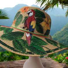 Express yourself in this jungle themed floppy hat.  Great for the beach, the afternoon walk, the beach, and the walk at the mall!  From the Serengeti Collection. At The Mall, Centre Commercial, The Walk, Beach Themed, Beach Themes, Sun Hats, Floppy Hat, Parrot, Beauty Book