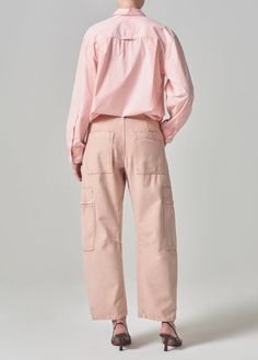 Easy and effortless. Our Marcelle features cargo-inspired detailing and relaxed straight leg that tapers at the ankle. Crafted a breathable but rigid, non-stretch twill for all day wear - style yours back to heels or sneakers. This fit is true to size. Looks Like: Washed out soft pink Feels Like: Midweight yet breathable rigid twill with a soft hand that gives a vintage feel. This product is made with regenerative cotton from Citizens of Humanity Group’s Regenerative Cotton Program. Our program Spring Everyday Cargo Jeans With Patch Pockets, Spring Cargo Jeans With Patch Pockets For Everyday, Spring Utility Cargo Pants For Workwear, Utility Cargo Pants For Spring Workwear, Spring Relaxed Fit Cargo Jeans For Workwear, Spring Workwear Relaxed Fit Cargo Jeans, Spring Everyday Relaxed Fit Cargo Pants, Spring Cargo Jeans Relaxed Fit For Workwear, Spring Cargo Pants With Relaxed Fit