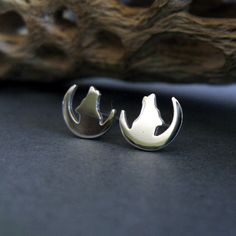 Make a subtle statement with these stud earrings. Handcrafted in the USA with sterling silver or 14k gold, these earrings are perfect for standing out without howling loudly! Show off your inner wolf and let your style shine! The Details∞ Artisan handmade jewelry∞ Small Studs (approx 8 x 9mm)∞ Sterling silver, 14k gold-filled, or solid 14k yellow gold∞ Earring backs included in the metal of your choice∞ Made to order∞ Gift box included∞ Made in the USAIs 14k gold-filled right for you? If you are Sterling Silver Tarnish-resistant Cartilage Earrings As Gift, Crescent Internally Threaded Jewelry As Gift, Crescent Internally Threaded Jewelry For Gifts, Internally Threaded Crescent Jewelry As Gift, Symbolic Moon-shaped Sterling Silver Earrings, Symbolic Moon Shaped Sterling Silver Earrings, Minimalist Moon-shaped Sterling Silver Cartilage Earrings, Modern Sterling Silver Moon Jewelry, Unique Sterling Silver Internally Threaded Plug Earrings