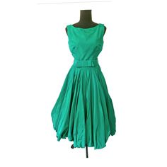 The faffeta is to die for, seriously beautiful, comes with original belt, was like it was worn once, and then put away.  In Mint condition and I don't say that too often.  the bubble hem is amazing, the back of the dress features a metal zipper, with hook and eye, belt has snaps.  Dress is small. Bust 34-35 shoulder 13 waist 24.5 shoulder to waist 16 hip open length 46 ** Be aware that the dress has underarm perspiration pads sewn in, they can removed if you like. Bubble Hem Dress, Julie Miller, Hip Openers, Bubble Hem, The Bubble, 1950s Vintage, Hem Dress, Metal Zipper, Dress Clothes For Women