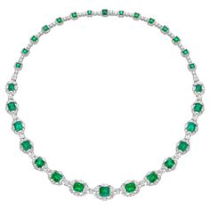 Radial Emeralds by Sunita Nahata Fine Design. This collection features vibrant green emeralds set on a bed of stunning White diamonds set in white gold. This is a dainty and delicate bridal necklace that still exudes a glamorous and luxurious look. Emerald Necklace in 18Karat White Yellow Gold with White Diamond. Emerald: 1.52 carat, 7.30X6.50X4.60mm size, octagon shape. Emerald: 1.31 carat, 7.10X6.00X4.30mm size, octagon shape. Emerald: 1.09 carat, 6.80X6.00X4.10mm size, octagon shape. Emerald: Emerald Necklace With Diamonds And 17 Jewels, Fine Jewelry Green Emerald Necklace With Brilliant Cut, Fine Jewelry Emerald Necklace With Brilliant Cut, Luxury White Gold Emerald Necklace With Brilliant Cut, Luxury Hand Set Round Emerald Necklace, Luxury White Gold Brilliant Cut Emerald Necklace, Luxury Hand Set Emerald Necklace For Anniversary, Luxury Hand-set Round Emerald Necklace, Luxury Green Emerald Necklace With Diamond Accents