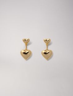 Heart earrings | Maje US Gold Metal Earrings With Heart Charm, Gold Double Heart Metal Earrings, Gold Metal Double Heart Earrings, Yellow Gold Heart Charm Earrings, Yellow Gold Heart Earrings With Charm, Yellow Gold Earrings With Heart Charm, Chic Gold Heart Earrings With Heart Charm, Chic Gold Heart Earrings With Charm, Brass Heart Drop Earrings