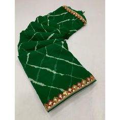 Green colored saree is made from georgette fabric which is highlighted with beautiful printed with sequince embroidered lace border work as shown. comes along unstitched banglori silk blouse piece which you can customise as per your design/style. Occasion - You can wear this saree for casual and daily and ideal for any fashionista. Note:- The actual product may differ slightly in color and design from the one illustrated in the images when compared with computer or mobile screen. Measurements: S Mobile Screen, Georgette Saree, Georgette Fabric, Lace Border, Georgette Sarees, Embroidered Lace, Blouse Piece, Surprise Gifts, Design Style