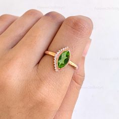 Thank you for your attention at Forever2Infinity. Such a unique piece to wear occasionally or can be used regularly. Can be used to gift your loved ones, to make them feel special. This is a Beautiful Natural Peridot Engagement ring in solid gold. Gemstone - Natural Peridot (Available in other gemstones as well) Gemstone Shape - Marquise Gemstone Size - 12x6 mm Accent stones- Moissanite Metal - Sterling Silver with / White Gold plating / Available in 14k Solid Rose/Yellow/ White Gold Metal finish - Smooth Happy to welcome any custom request. Welcome to the our shop, great to know you are there. You must know that you're getting high quality hand-made crafted jewelry when you purchase items from Forever2Infinity. ♠ This brilliant ring is ready to ship. Made with natural gemstone in 925 ster Peridot Wedding Ring, Peridot Engagement Ring, Bridal Proposal, Peridot Engagement Rings, Rose Gold Promise Ring, Gold Promise Ring, Engagement Ring Vintage, Natural Gemstone Jewelry, Rose Yellow