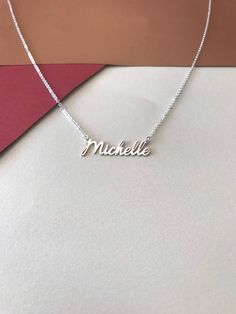 "Mothers Day Gift -Personalized Handmade Silver Jewelry Crafted with love from solid sterling silver-Christmas day gift -Valentines day gift-Birthday gift-Anniversay Gifts Name necklace * Gold Necklace * Mini Necklace * Bridesmaid Gift * Personalized Gifts * Tiny Name Necklace * Gift For Mom * Gift For Women This necklace is for you .Type the name you want to explain.If you have a different question,you can ask any time from the messages section. -About Us- DreamNecklaceArt Produces this necklac Silver Custom Name Necklace, White Gold Name Necklace Custom Name Gift, Minimalist Sterling Silver Name Necklace For Birthday, Minimalist Sterling Silver Name Necklace As Birthday Gift, Custom Name White Gold Necklace Gift, Elegant Silver Nickel-free Name Necklace, Silver Minimalist Name Necklace For Birthday Gift, Silver Minimalist Name Necklace For Birthday, Minimalist Silver Name Necklace For Birthday