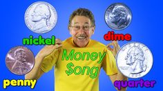 a man in yellow shirt standing next to coins with words written on the front and back