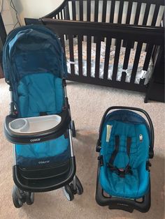 two baby strollers sitting next to each other on the floor