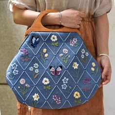 Do you love embroidery and embroidered handbag? If so, this DIY craft kit is perfect for you! 🦋 This kit contains everything you need to create a unique embroidery bag embroidery. What's included in the kit is detailed in the pictures. This kit also has the following features: ❤️The materials in the kit are all very high quality ❤️The finished bag has a large capacity, and mobile phones, wallets, cosmetics, etc. can be put in it. ❤️Metal fittings combined with acrylic, simple and stylish, very easy to match. ❤️Provide instructions and detailed video tutorials, even novices can easily complete This kit is suitable for beginners and experienced embroiderers alike. You will learn various stitches and techniques to bring the bag to life. The finished embroidery bag can be very nice decoration Bag Embroidery, Embroidered Handbag, Diy Craft Kit, Love Embroidery, Unique Embroidery, Embroidery Bags, Diy Craft Kits, Cotton Linen Fabric, Embroidered Bag