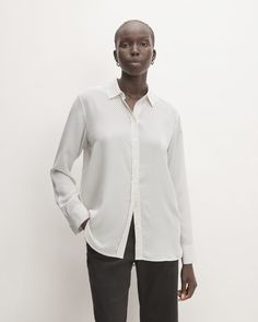 A more relaxed take on the classic button-down—with a silky smooth feel. Polished and easy, the Clean Silk Relaxed Shirt has a traditional point collar and a round hem that looks just as good worn loose as it does tucked in. Plus, it’s made of our eco-conscious Clean Silk, for more beauty and less waste. Classic Spring Blouse With Shirttail Hem, Classic Blouse With Shirttail Hem For Spring, Classic Shirttail Hem Blouse For Spring, Classic Shirt With Shirttail Hem For Fall, Classic Relaxed Fit Blouse For Business Casual, Classic Collared Blouse With Relaxed Fit, Classic Relaxed Fit Blouse For Daywear, Classic Blouse With Relaxed Fit And Spread Collar, Classic Blouse With Relaxed Fit And Shirttail Hem