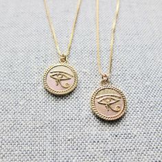 "Eye of Ra Pendant Necklace,Eye of Horus Necklace,Gold Medallion Necklace,Gold Coin Necklace,Egyptian Jewelry,Simple Layering Necklace Gold ★Medallion Metal- 24k Gold Plated over Brass ★Medallion Dimension- 15.2mm diameter ★Chain Metal- 14k Gold Fill ★Chain Length- 16 inches ★We want you to love your new jewelry and gladly accept returns. ★Arrives ready for gifting (example in last photo) and usually ships same day or next day. Check shop announcement for occasional delays. ★Lead- and nickel-fre Gold Plated Round Charm Necklaces, Gold Round Gold-plated Charm Necklaces, Symbolic Gold-plated Coin Necklace, Gold Plated Round Amulet Charm Necklace, Symbolic Rose Gold Round Jewelry, Symbolic Gold Plated Medallion Necklace, Symbolic Gold-plated Medallion Necklace, Gold Plated Symbolic Medallion Necklace, Symbolic Tarnish Resistant Round Pendant Jewelry