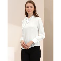 This blouse is made from smooth satin for an elevated feel with a stand collar and shirring on the cuffs for a pretty finishing touch. An effortless option to take the classic top at the office, this elegant blouse from Allegra K is gently designed with a stand collar and bow-tie design that makes a unique and charming. Finished with two-button cuffs is easy to roll up or put down your sleeves to create a stylish and casual look. Classic White Satin Blouse, Feminine Satin Tops For Work, Feminine Satin Tops For Workwear, Elegant Formal Shirt With Stand Collar, Elegant Stand Collar Shirt For Formal Occasions, Elegant Tops With Button Cuffs And Stand Collar, Elegant Tops With Stand Collar And Button Cuffs, Elegant Top With Stand Collar, White Satin Tops For Workwear