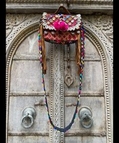 About bag  Indo-gypsy fusion, everyday use hand bag made from Banjara fabrics sourced from Vintage tribal costumes of regions of Rajastan and Gujarat. These are embellished with light catching coins, and intricate bead work tassels. Size - length 15 inches/ width 21 inches Company details:  Company name: Houseoftextile  Contact number: +919784447473  Email id: houseoftextile77@gmail.com  Shipping & custom : Delivery through one of the finest service providers : Skyway, Fedex, UPS  And DHL. Any local taxes\custom has to be paid by client. The products are non returnable. Important: Kindly provide your mobile number whenever you make payment as it is mandatory for standard shipping services. Payment:  We accept payment by the following  methods : PayPal Your payment is safe & secure with Pay Traditional Festive Potli Bag With Tassels, Traditional Potli Bag With Tassels For Festive Occasions, Multicolor Handwork Bags For Festive Occasions, Embroidered Shoulder Bag For Festivals, Festival Multicolor Embroidered Bags With Tassels, Handmade Multicolor Embroidered Potli Bag For Festivals, Traditional Potli Bag With Tassels For Festivals, Multicolor Bags For Festivals, Traditional Potli Bag For Daily Use And Festivals