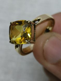 Yellow sapphire, also known as "Pukhraj" in Hindi, is a gemstone that belongs to the corundum family, just like blue sapphire. It is the yellow variety of corundum and is valued for its vibrant yellow color. Yellow sapphire is composed of aluminum oxide (Al2O3) with traces of iron that give it its yellow hue. The color of yellow sapphire can range from pale yellow to intense golden yellow. The most prized and valuable yellow sapphires typically exhibit a pure, vibrant yellow color without any hints of other colors. Some yellow sapphires may also display slight variations in color across their crystal structure. Yellow sapphire is associated with various positive attributes and is believed to possess astrological and metaphysical properties. In Vedic astrology, yellow sapphire is considered Fine Jewelry Citrine Necklace With Center Stone, Gold Sapphire Cushion Cut Jewelry, Citrine Birthstone Jewelry In Round Cut, Citrine Birthstone Jewelry Round Cut, Gold Yellow Sapphire Ring Gift, Classic Hallmarked Citrine Jewelry, Gold Topaz Birthstone Ring With Gemstone, Gold Birthstone Ring With Topaz Gemstone, Gold Cushion Cut Sapphire Ring Fine Jewelry